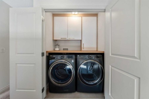 522 River Heights Crescent, Cochrane, AB - Indoor Photo Showing Laundry Room