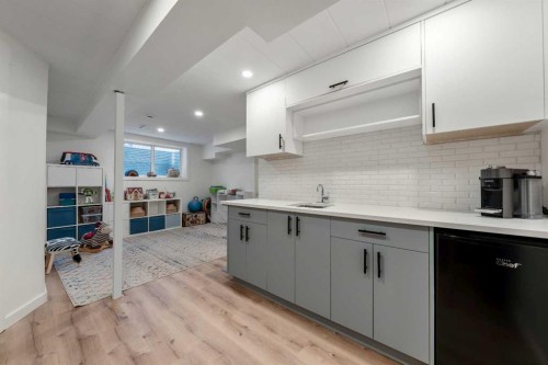 522 River Heights Crescent, Cochrane, AB - Indoor Photo Showing Kitchen With Upgraded Kitchen