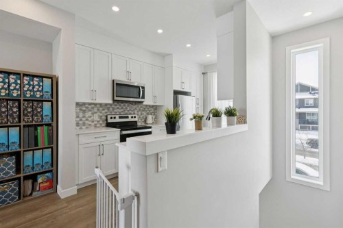 579 Evanston Link, Calgary, AB - Indoor Photo Showing Kitchen With Upgraded Kitchen