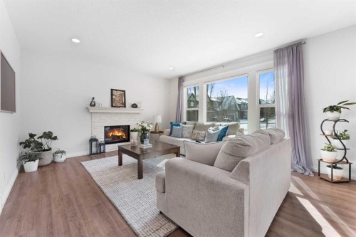 310 Mahogany Manor Se, Calgary, AB - Indoor Photo Showing Living Room With Fireplace