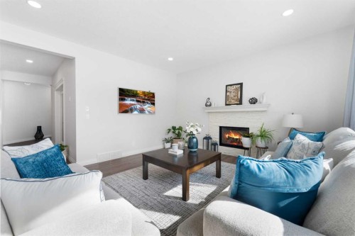 310 Mahogany Manor Se, Calgary, AB - Indoor Photo Showing Living Room With Fireplace