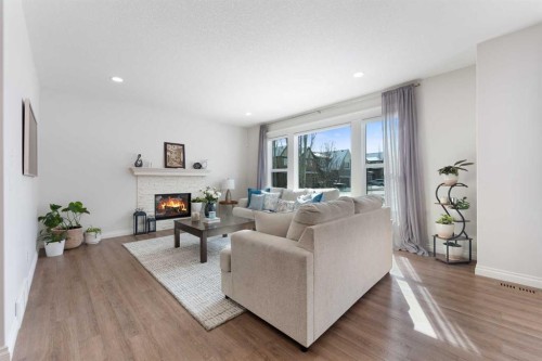 310 Mahogany Manor Se, Calgary, AB - Indoor Photo Showing Living Room With Fireplace