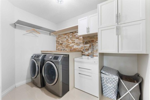 310 Mahogany Manor Se, Calgary, AB - Indoor Photo Showing Laundry Room