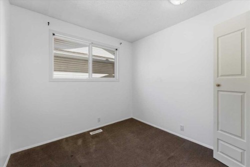716 Whitemont Drive Ne, Calgary, AB - Indoor Photo Showing Other Room