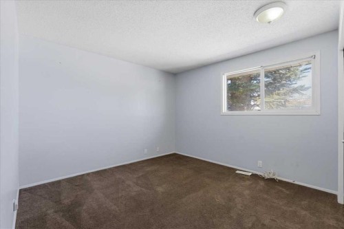 716 Whitemont Drive Ne, Calgary, AB - Indoor Photo Showing Other Room
