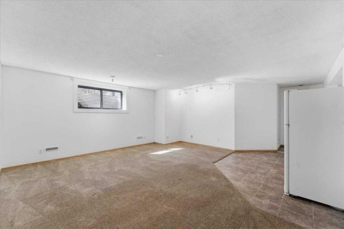 716 Whitemont Drive Ne, Calgary, AB - Indoor Photo Showing Other Room