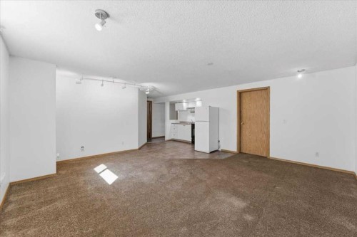 716 Whitemont Drive Ne, Calgary, AB - Indoor Photo Showing Other Room
