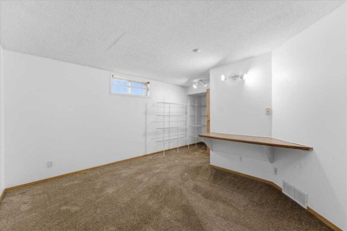 716 Whitemont Drive Ne, Calgary, AB - Indoor Photo Showing Other Room