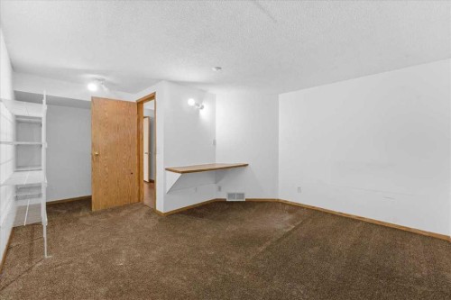 716 Whitemont Drive Ne, Calgary, AB - Indoor Photo Showing Other Room