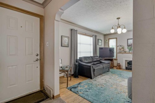 1411 20 Avenue Nw, Calgary, AB - Indoor With Fireplace