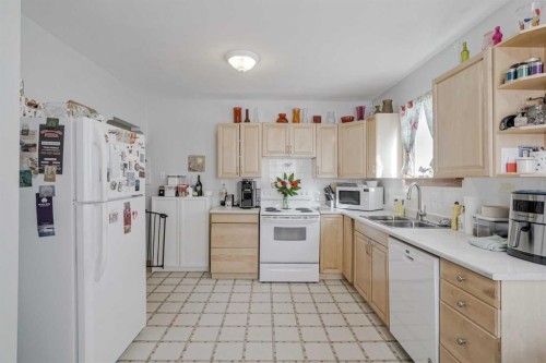1411 20 Avenue Nw, Calgary, AB - Indoor Photo Showing Kitchen With Double Sink