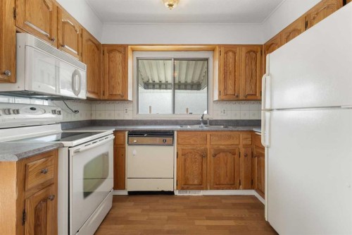 5216 Marian Road Ne, Calgary, AB - Indoor Photo Showing Kitchen With Double Sink