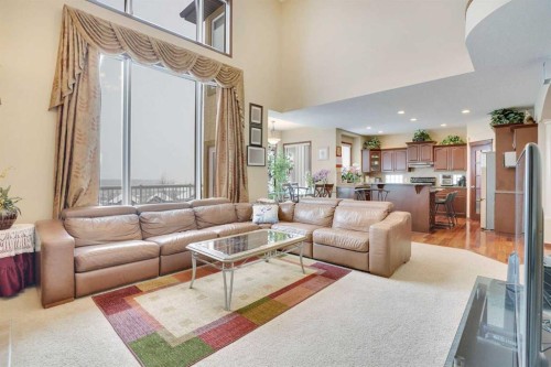 160 Tremblant Way Sw, Calgary, AB - Indoor Photo Showing Living Room