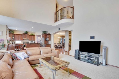 160 Tremblant Way Sw, Calgary, AB - Indoor Photo Showing Living Room