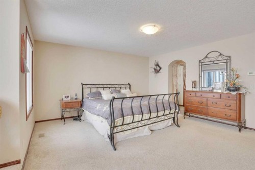 160 Tremblant Way Sw, Calgary, AB - Indoor Photo Showing Bedroom