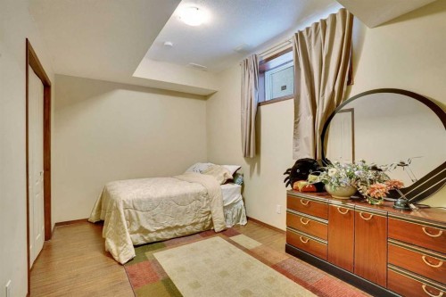 160 Tremblant Way Sw, Calgary, AB - Indoor Photo Showing Bedroom