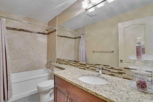 160 Tremblant Way Sw, Calgary, AB - Indoor Photo Showing Bathroom