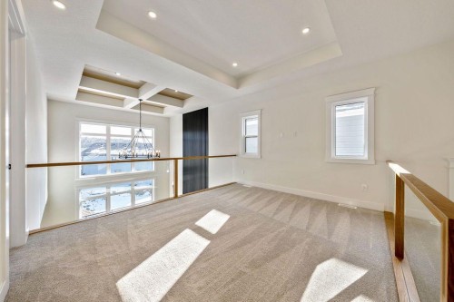 68 Sunvalley Way, Cochrane, AB - Indoor Photo Showing Other Room