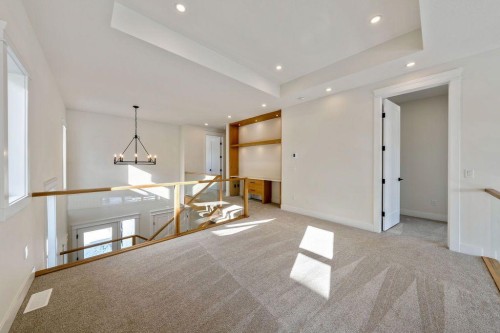 68 Sunvalley Way, Cochrane, AB - Indoor Photo Showing Other Room