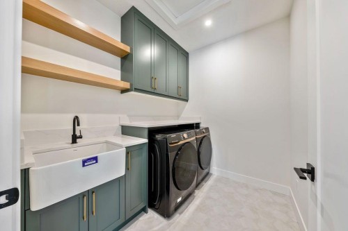 68 Sunvalley Way, Cochrane, AB - Indoor Photo Showing Laundry Room