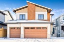 68 Sunvalley Way, Cochrane, AB  - Outdoor With Exterior 