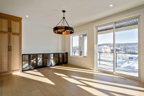 68 Sunvalley Way, Cochrane, AB - Indoor Photo Showing Other Room