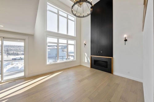 68 Sunvalley Way, Cochrane, AB - Indoor Photo Showing Other Room