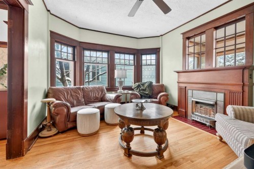 2713 9 Avenue Se, Calgary, AB - Indoor Photo Showing Living Room With Fireplace