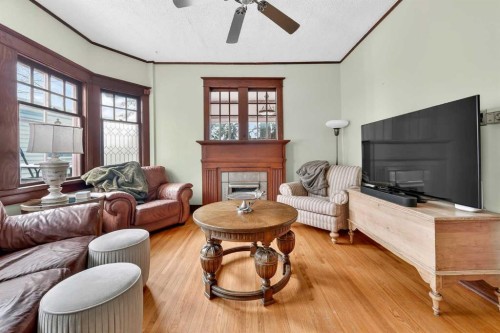 2713 9 Avenue Se, Calgary, AB - Indoor Photo Showing Living Room With Fireplace