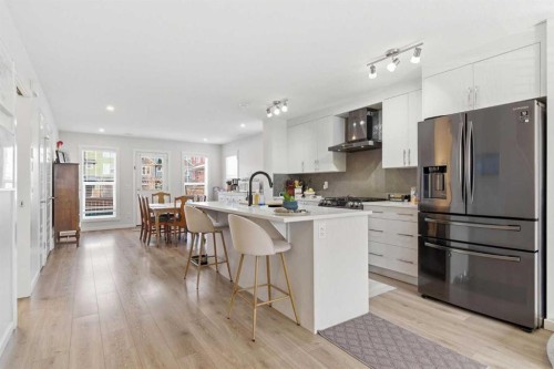 479 Cranbrook Square Se, Calgary, AB - Indoor Photo Showing Kitchen With Upgraded Kitchen