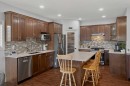 207 Strathmore Lakes Bend, Strathmore, AB  - Indoor Photo Showing Kitchen With Upgraded Kitchen 