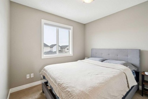 56 Silverado Plains View Sw, Calgary, AB - Indoor Photo Showing Bedroom