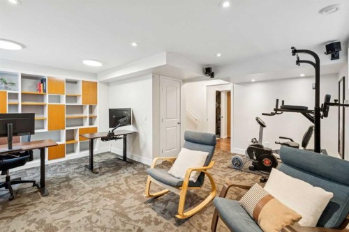 56 Silverado Plains View Sw, Calgary, AB - Indoor Photo Showing Gym Room