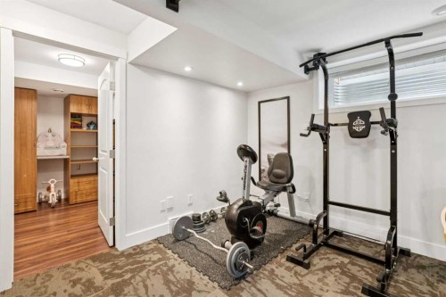 56 Silverado Plains View Sw, Calgary, AB - Indoor Photo Showing Gym Room