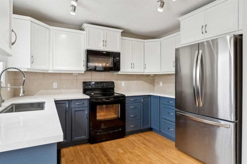 56 Silverado Plains View Sw, Calgary, AB - Indoor Photo Showing Kitchen