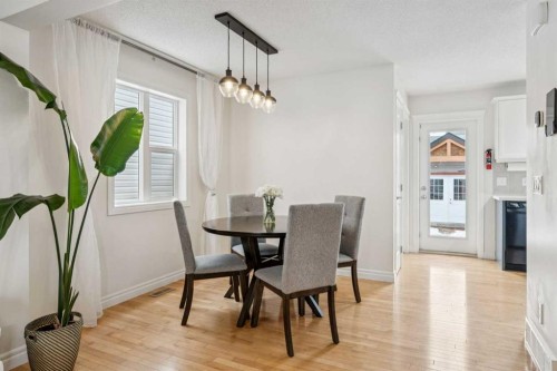 56 Silverado Plains View Sw, Calgary, AB - Indoor Photo Showing Dining Room