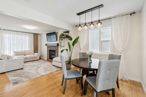 56 Silverado Plains View Sw, Calgary, AB - Indoor With Fireplace