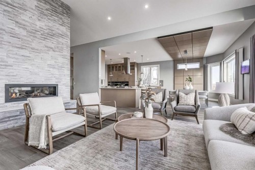 26 Patina Hill Sw, Calgary, AB - Indoor Photo Showing Living Room With Fireplace