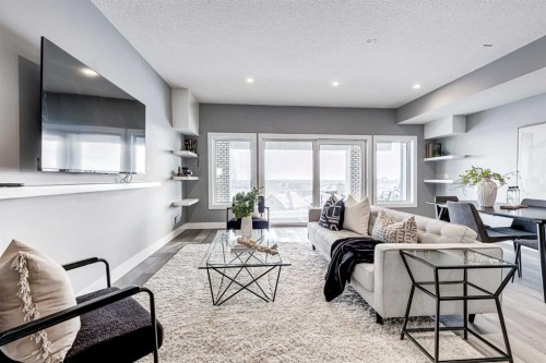 26 Patina Hill Sw, Calgary, AB - Indoor Photo Showing Living Room
