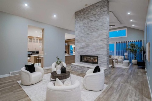 26 Patina Hill Sw, Calgary, AB - Indoor Photo Showing Living Room With Fireplace