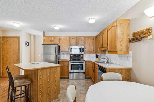 53 Somervale Point Sw, Calgary, AB - Indoor Photo Showing Kitchen With Double Sink