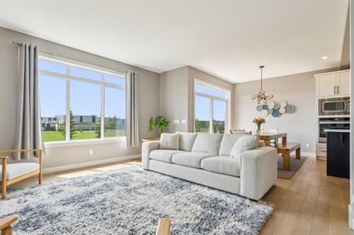 128 Sundown View, Cochrane, AB - Indoor Photo Showing Living Room