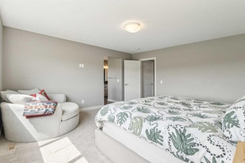 128 Sundown View, Cochrane, AB - Indoor Photo Showing Bedroom