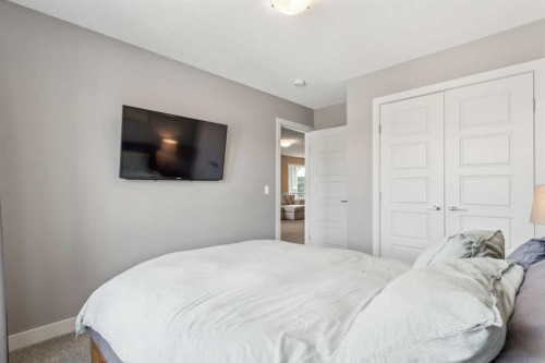 128 Sundown View, Cochrane, AB - Indoor Photo Showing Bedroom