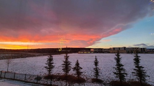 128 Sundown View, Cochrane, AB - Outdoor With Body Of Water With View