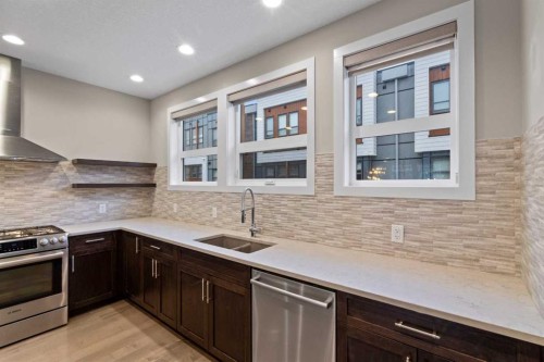 62 Norford Common Nw, Calgary, AB - Indoor Photo Showing Kitchen With Double Sink With Upgraded Kitchen
