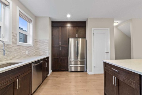 62 Norford Common Nw, Calgary, AB - Indoor Photo Showing Kitchen With Upgraded Kitchen