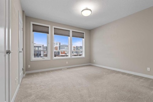 62 Norford Common Nw, Calgary, AB - Indoor Photo Showing Other Room