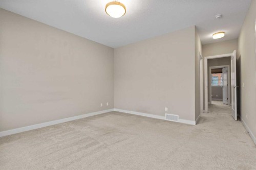 62 Norford Common Nw, Calgary, AB - Indoor Photo Showing Other Room