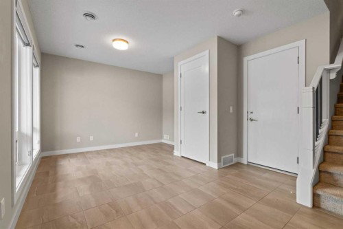 62 Norford Common Nw, Calgary, AB - Indoor Photo Showing Other Room